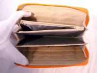 ラウンドファスナー長財布 オレンジ×アイスグレー 610